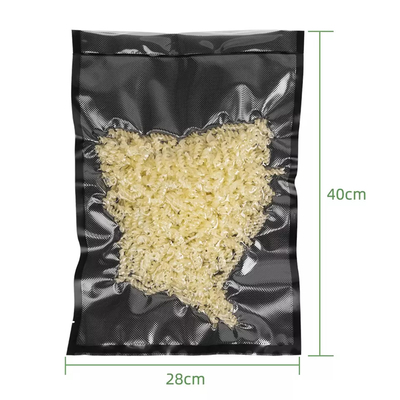 La bolsa de nylon del negro de la barrera de la calidad comercial del vacío grabó en relieve la cremallera plástica