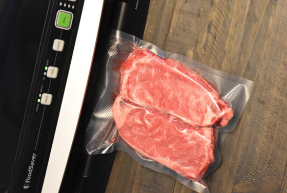 El PE grabó en relieve las bolsas de comida al vacío de las bolsas de comida del sellador al vacío para la carne