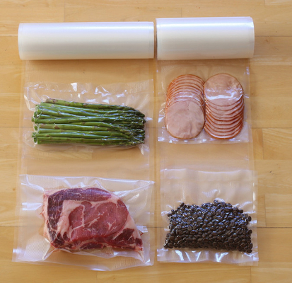 Alimentos frescos plásticos texturizados rollos transparentes del bolso del sello de vacío del nilón de la categoría alimenticia