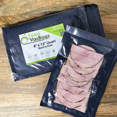 Rollos grabados en relieve de empaquetado de encargo del bolso del sello de vacío del sellado caliente del negro de la categoría alimenticia